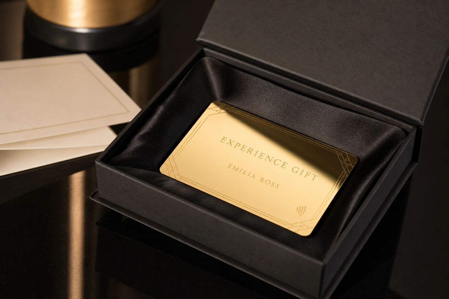 Gold experience gift card in a black rigid presentation box