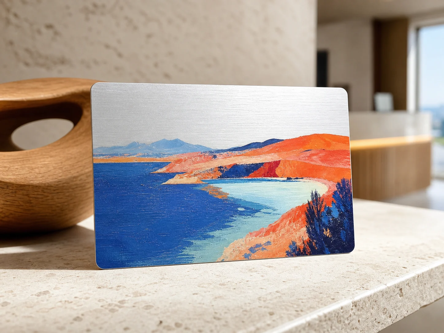 Brushed metal hotel key card with colourful coastal UV artwork