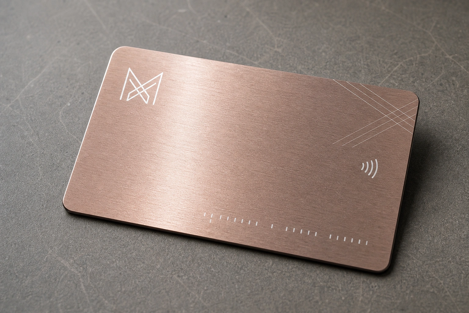 Rose-gold metal card with white UV detail