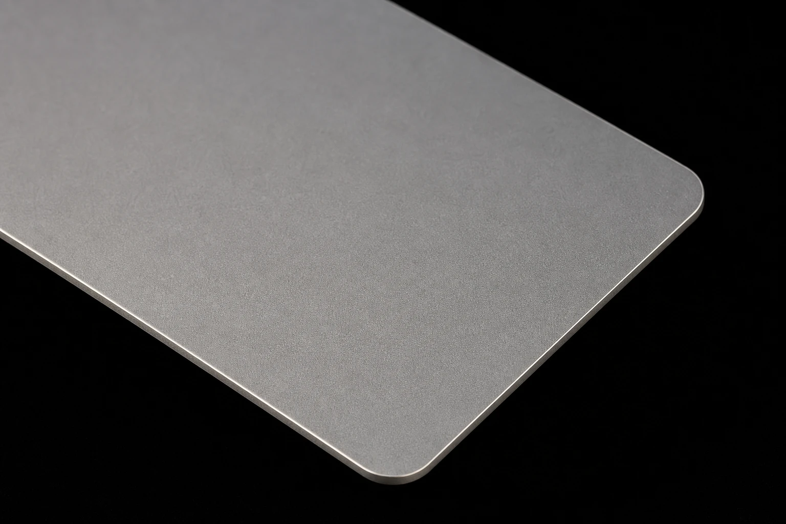 Titanium-grey card corner with a smooth edge