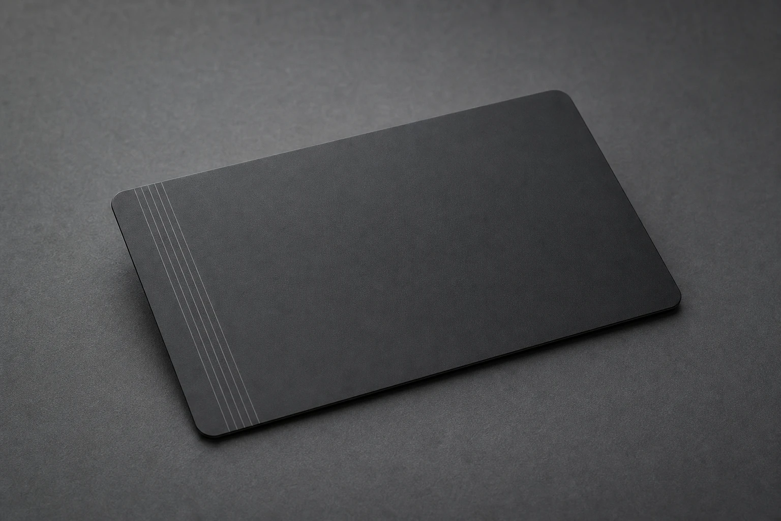 Matte black card with subtle laser linework