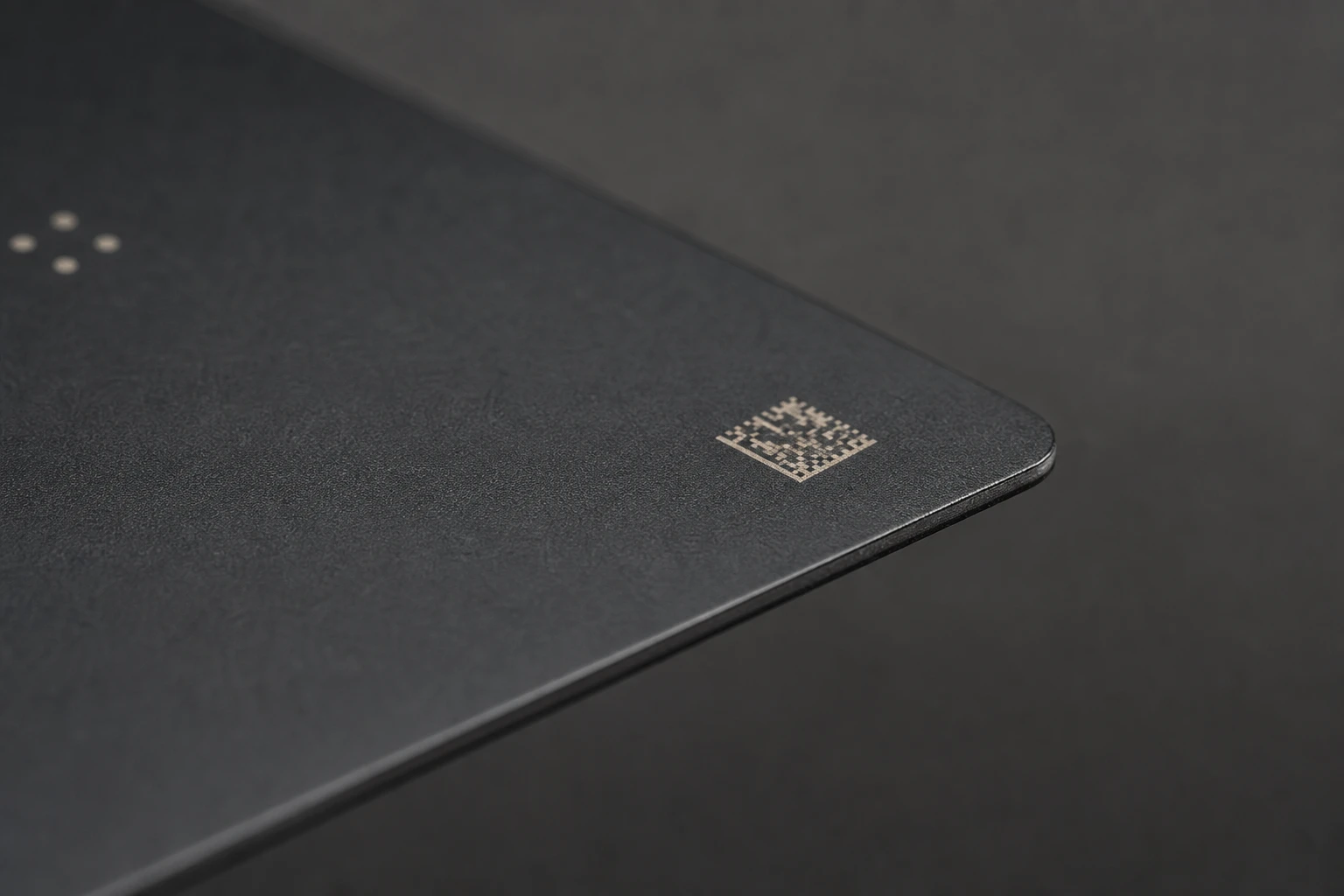 Matte black card with a small traceability zone