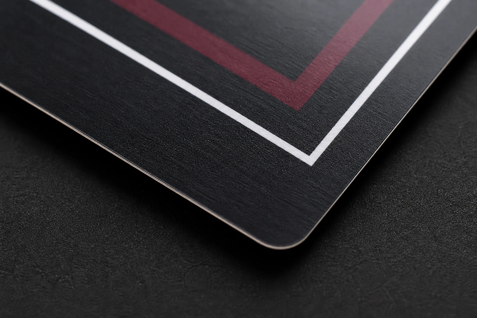 Black card detail showing UV underbase registration