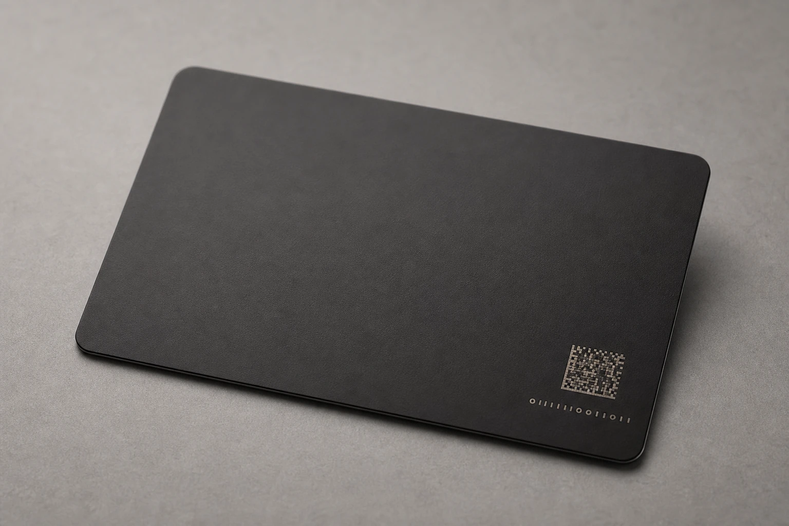 Black metal card with a precision laser data-matrix zone